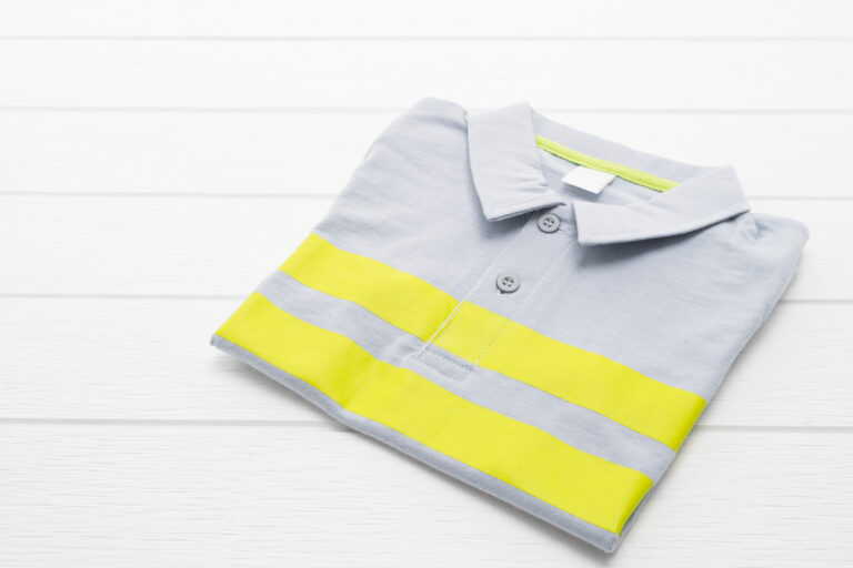 Shirt and Clothes on white wooden background