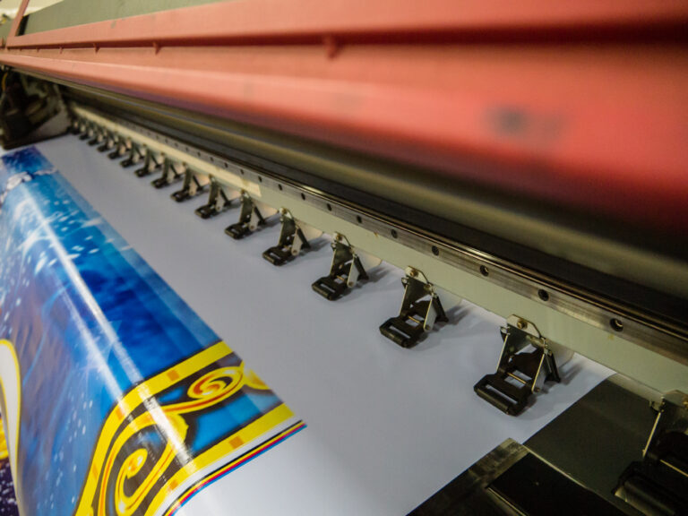 Large format printing machine in operation. Industry
